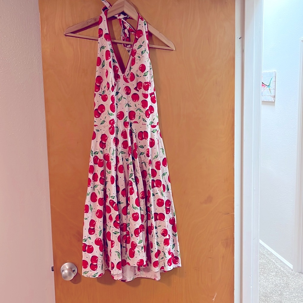 Cherry vintage dress will get anybody hot for you.
